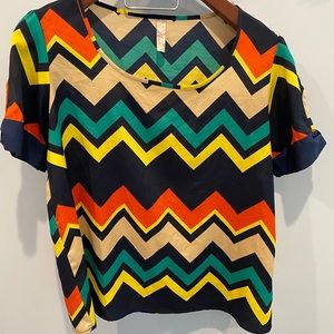 Myan patterned shirt.